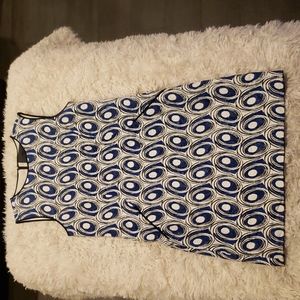 MISS WU size 4 sleeveless mini dress with pockets.